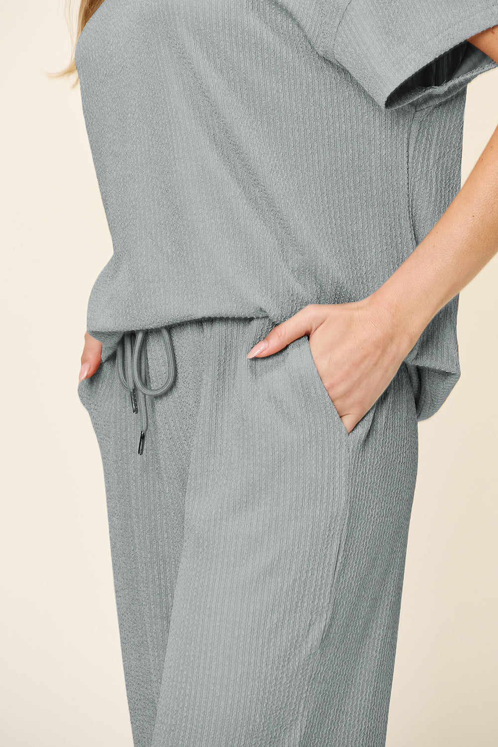 Double Take Women’s Full Size Texture Round Neck Short Sleeve T-Shirt and Wide Leg Pants Polyester Spandex Size S-3XL