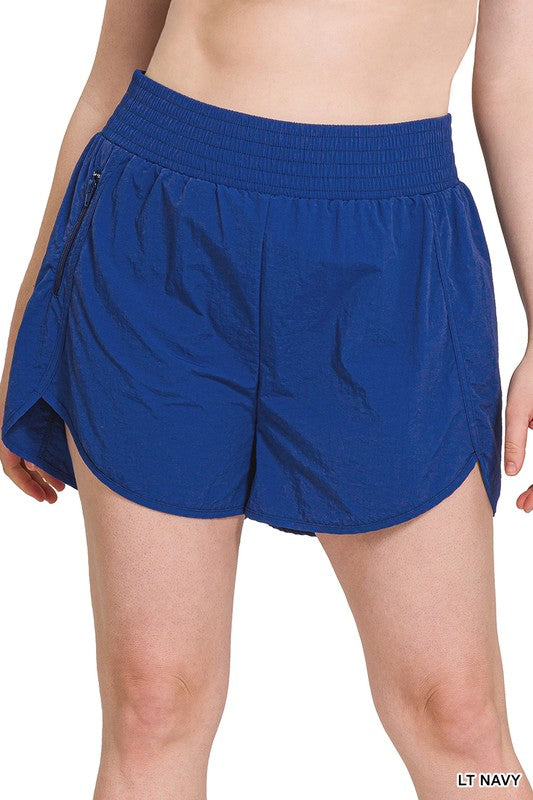 Zenana Clothing Plus Windbreaker Smocked Waistband Running Shorts