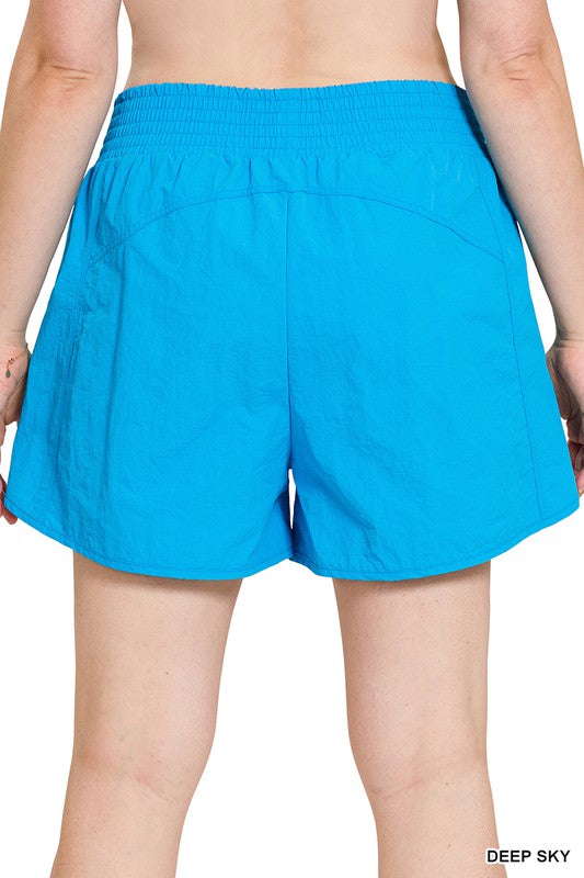 Zenana Clothing Plus Windbreaker Smocked Waistband Running Shorts