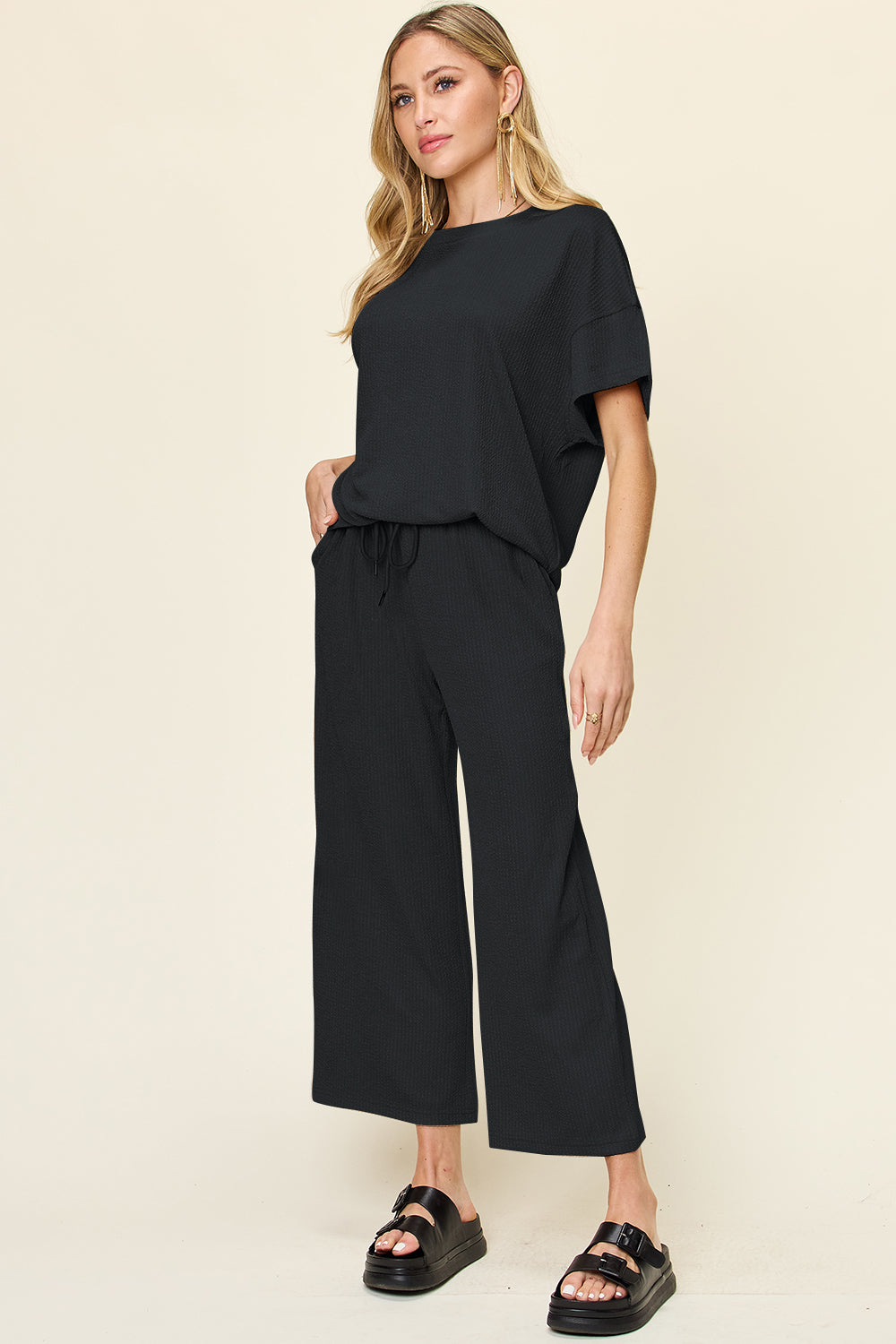 Double Take Women’s Full Size Texture Round Neck Short Sleeve T-Shirt and Wide Leg Pants Polyester Spandex Size S-3XL