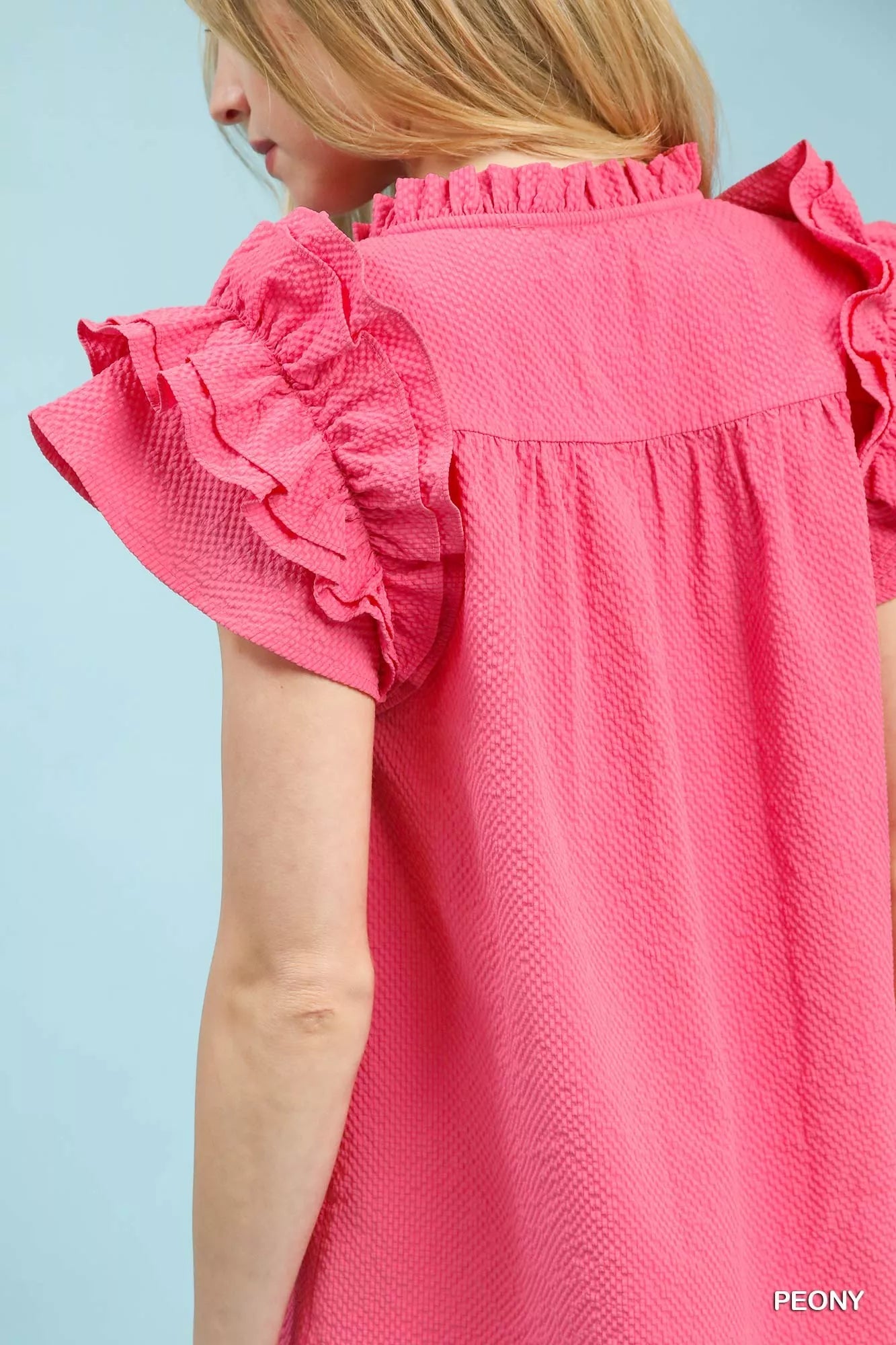 Umgee pink textured ruffle sleeve detail close-up