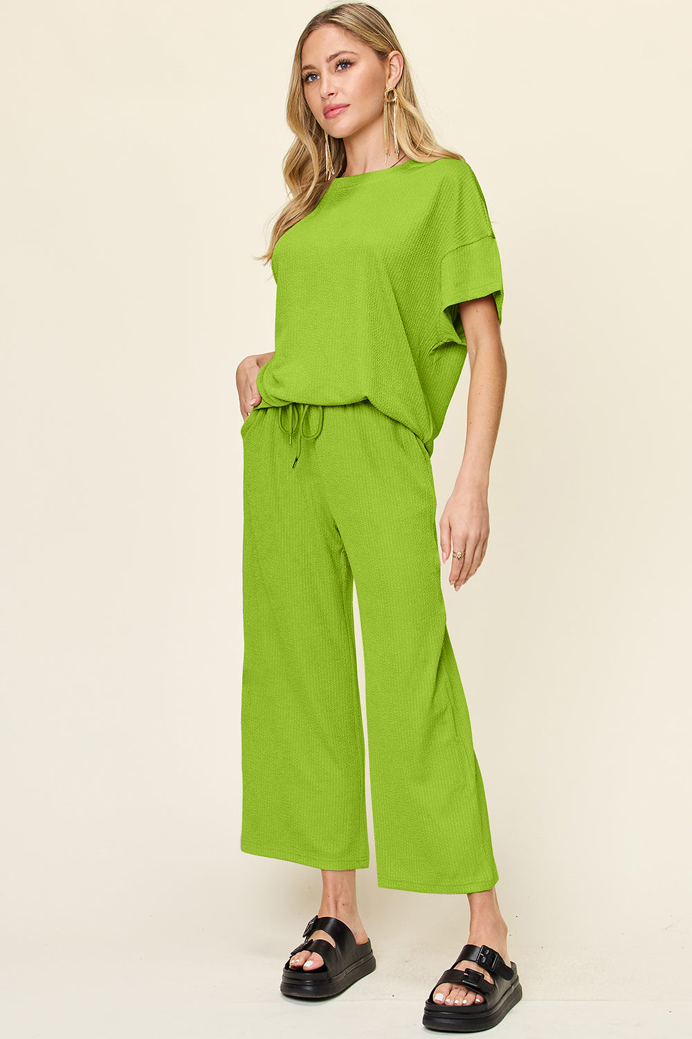 Double Take Women’s Full Size Texture Round Neck Short Sleeve T-Shirt and Wide Leg Pants Polyester Spandex Size S-3XL