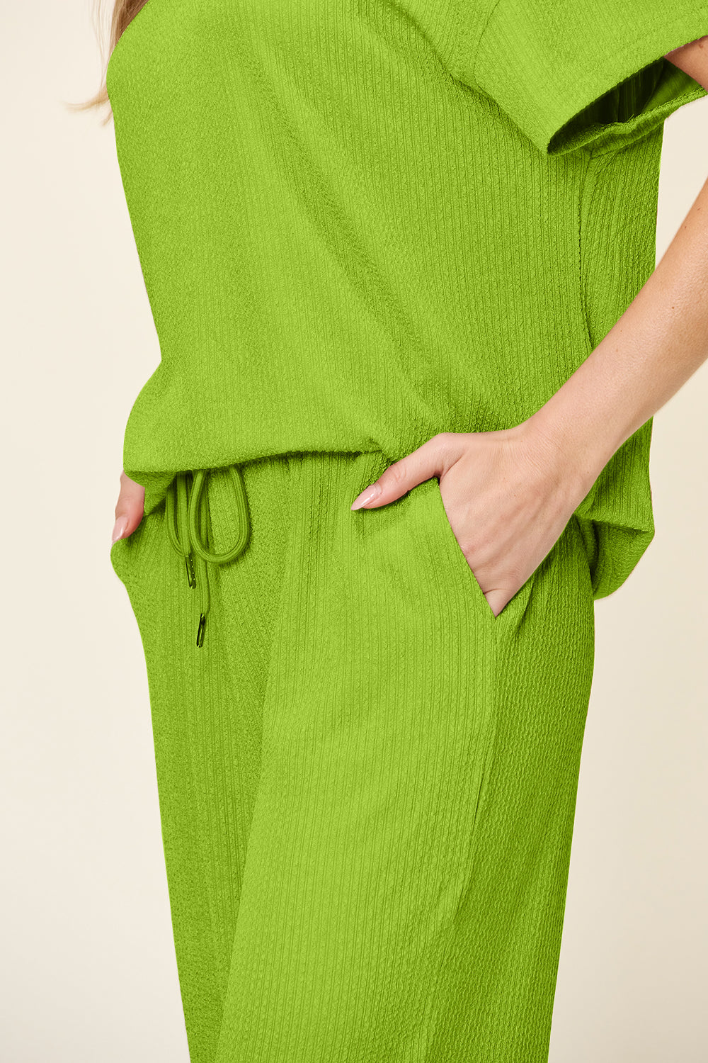 Double Take Women’s Full Size Texture Round Neck Short Sleeve T-Shirt and Wide Leg Pants Polyester Spandex Size S-3XL