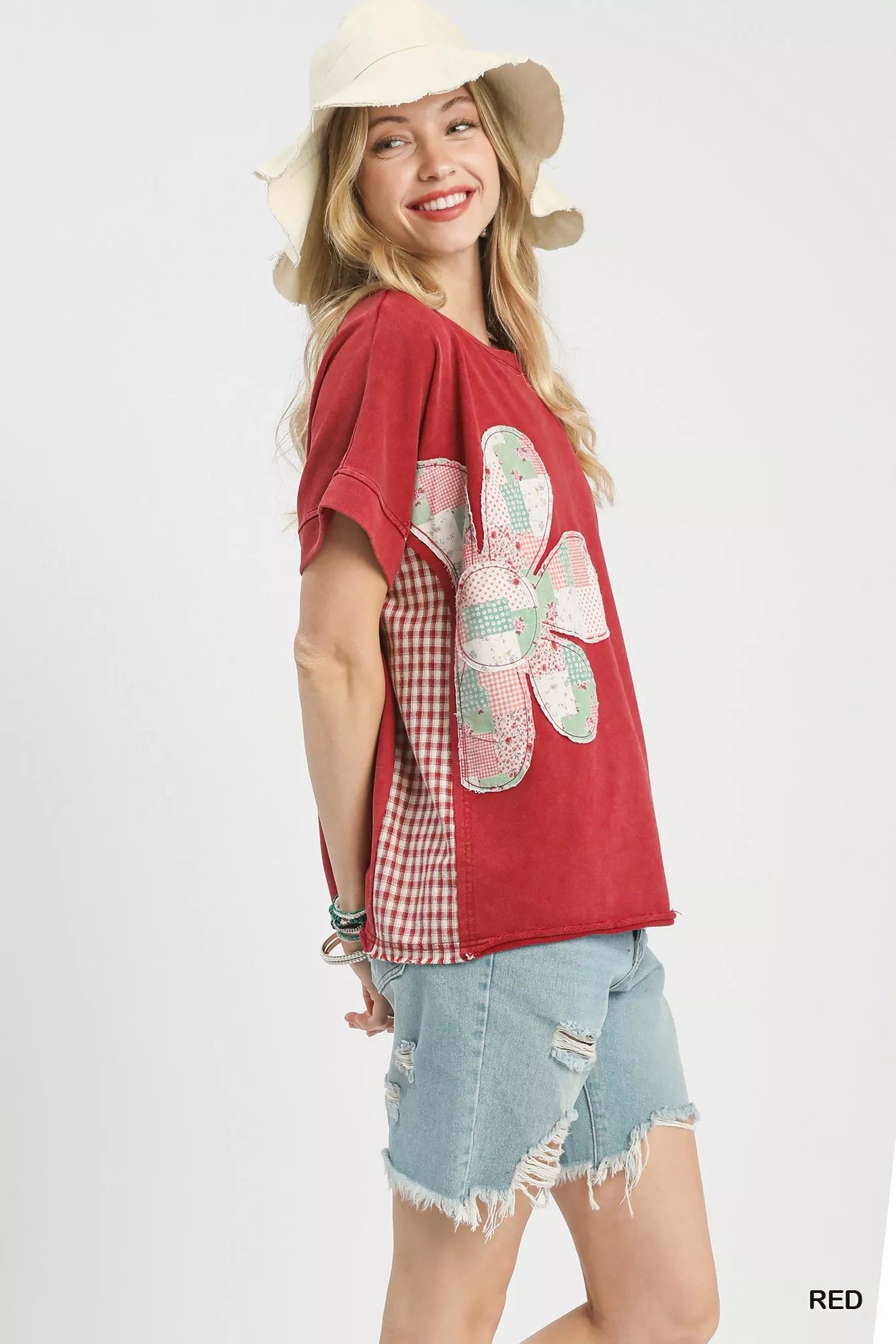 Red mineral wash French Terry top with patchwork flower design, distressed denim shorts