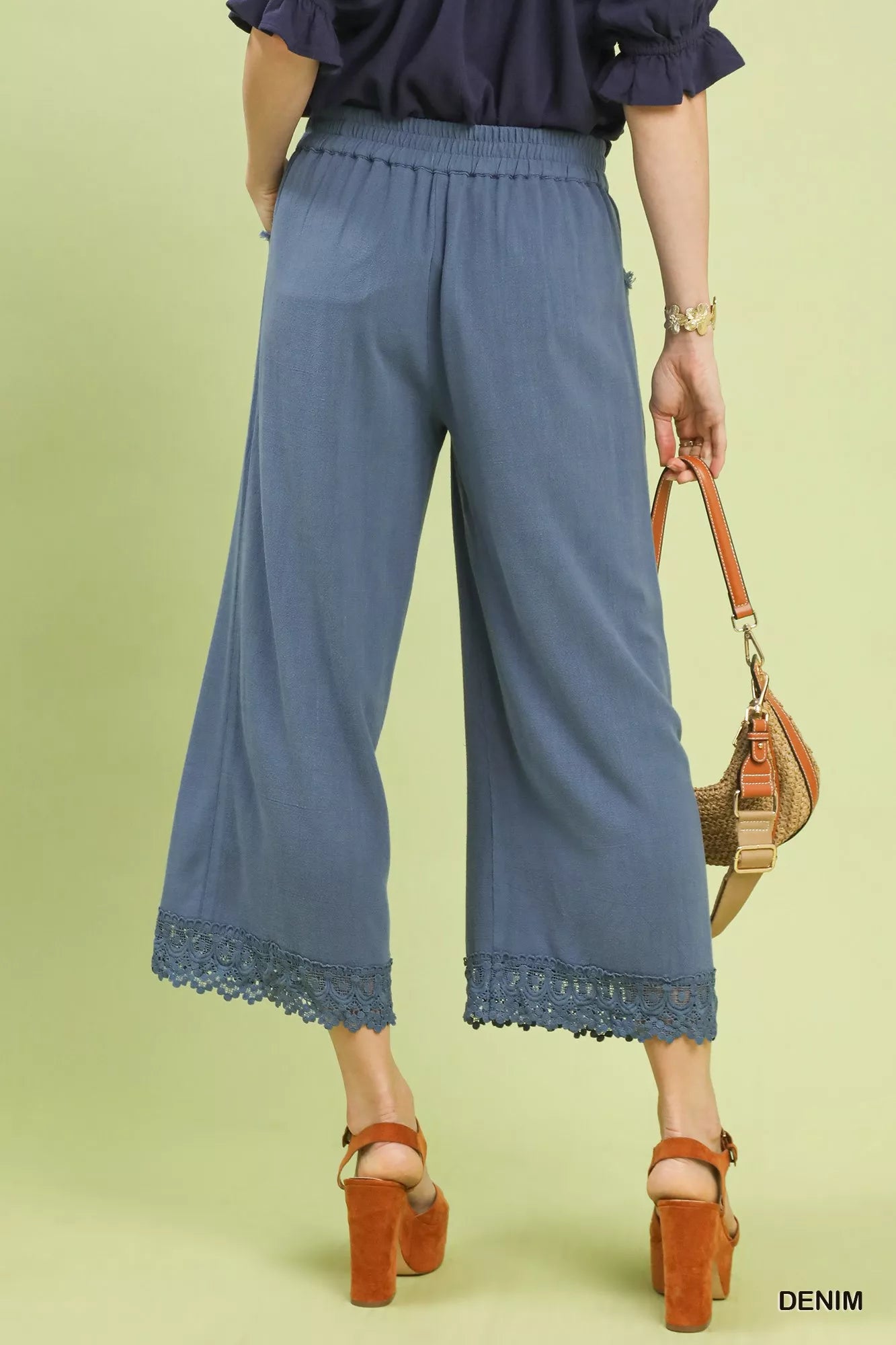 Umgee linen wide leg cropped pants with lace trim, back view showing elastic waistband and lace detail