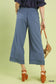 Umgee linen wide leg cropped pants with lace trim, back view showing elastic waistband and lace detail