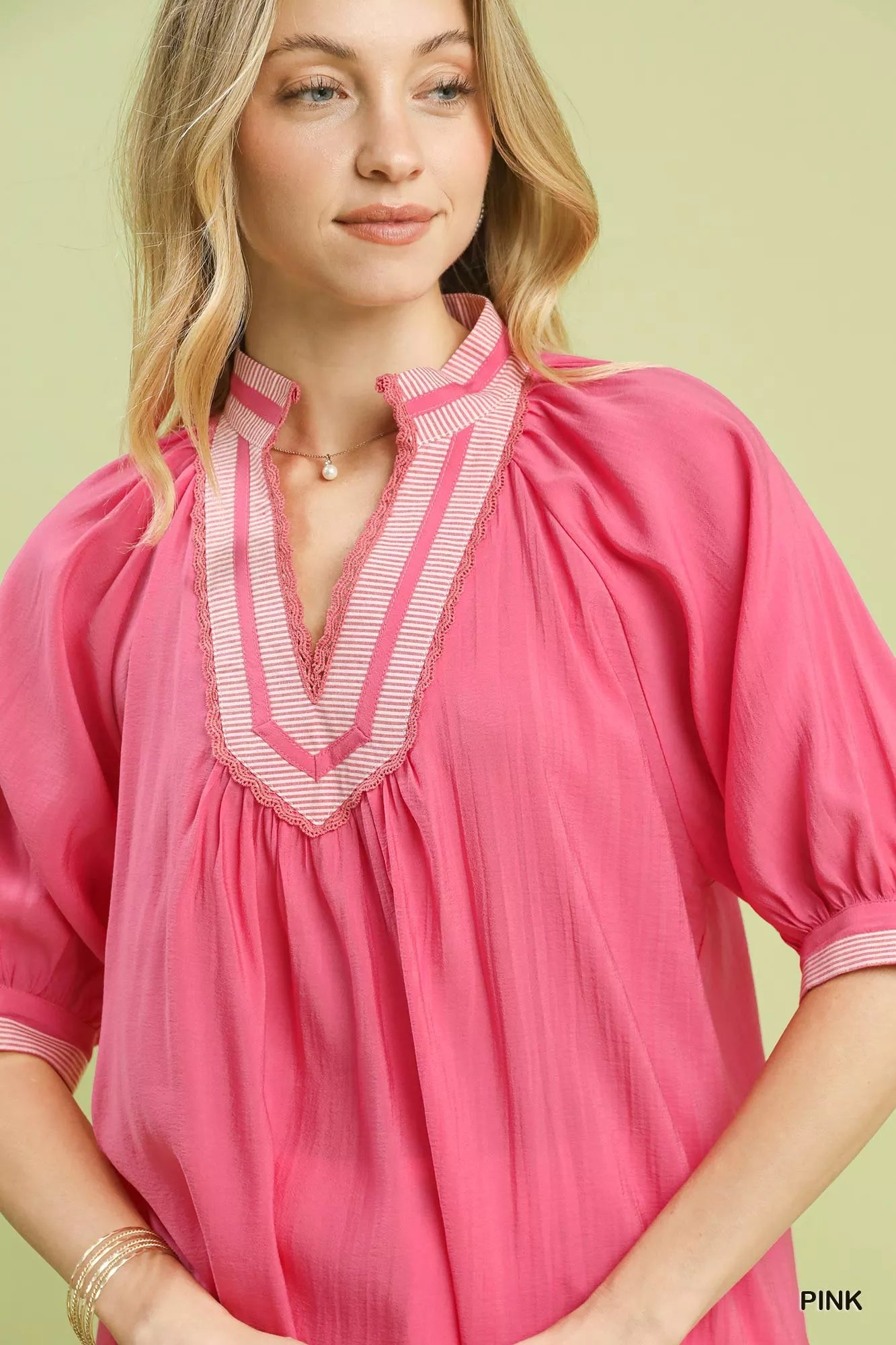 Blueberi Boutique's Umgee pink solid contrast-trim pleated top neckline detail