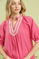 Blueberi Boutique's Umgee pink solid contrast-trim pleated top neckline detail