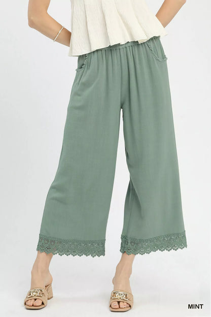Blueberi Boutique: Mint linen wide-leg cropped pants with lace trim, front view