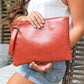 Soft Vegan PU Leather 100% Polyester Lined Grommet Detail Oversized Wristlet Clutch | 12" x 8"