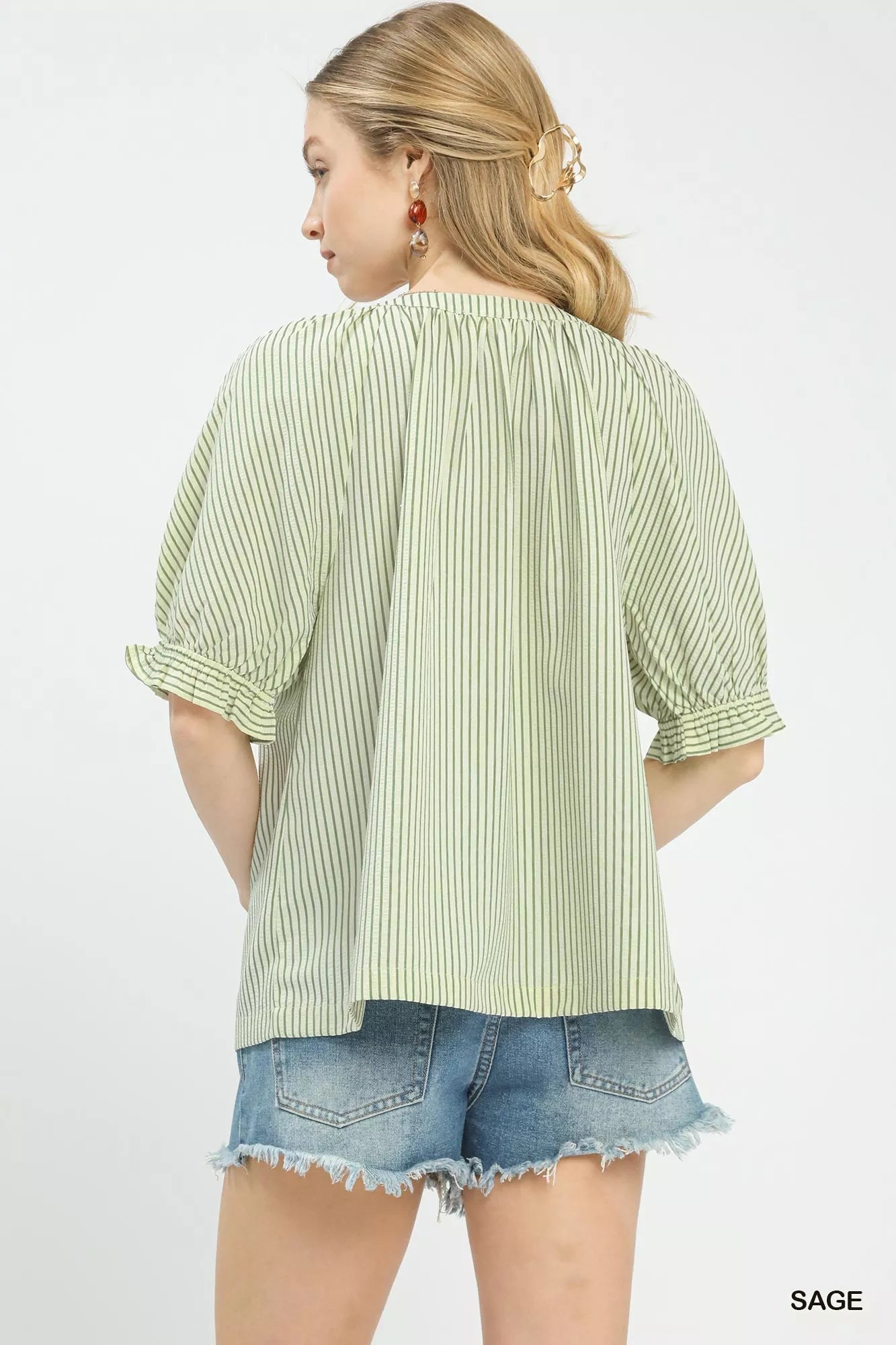 Back view of sage striped blouse with ruffled sleeves at Blueberi Boutique