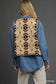 Umgee mix patterned sherpa vest back view, beige/brown patterns