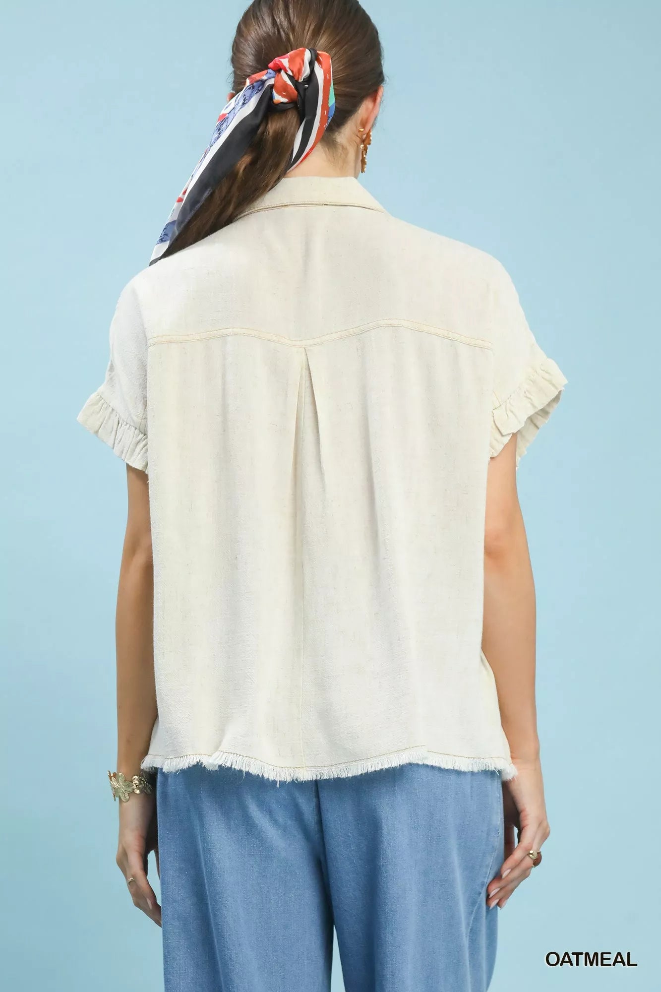 Blueberi Boutique Umgee oatmeal washed linen blend smocked shirt from behind with ruffled sleeves