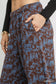 Close-up of brown/blue scenic print casual sweatpants pocket with 'Apres All Day' text - Blueberi Boutique