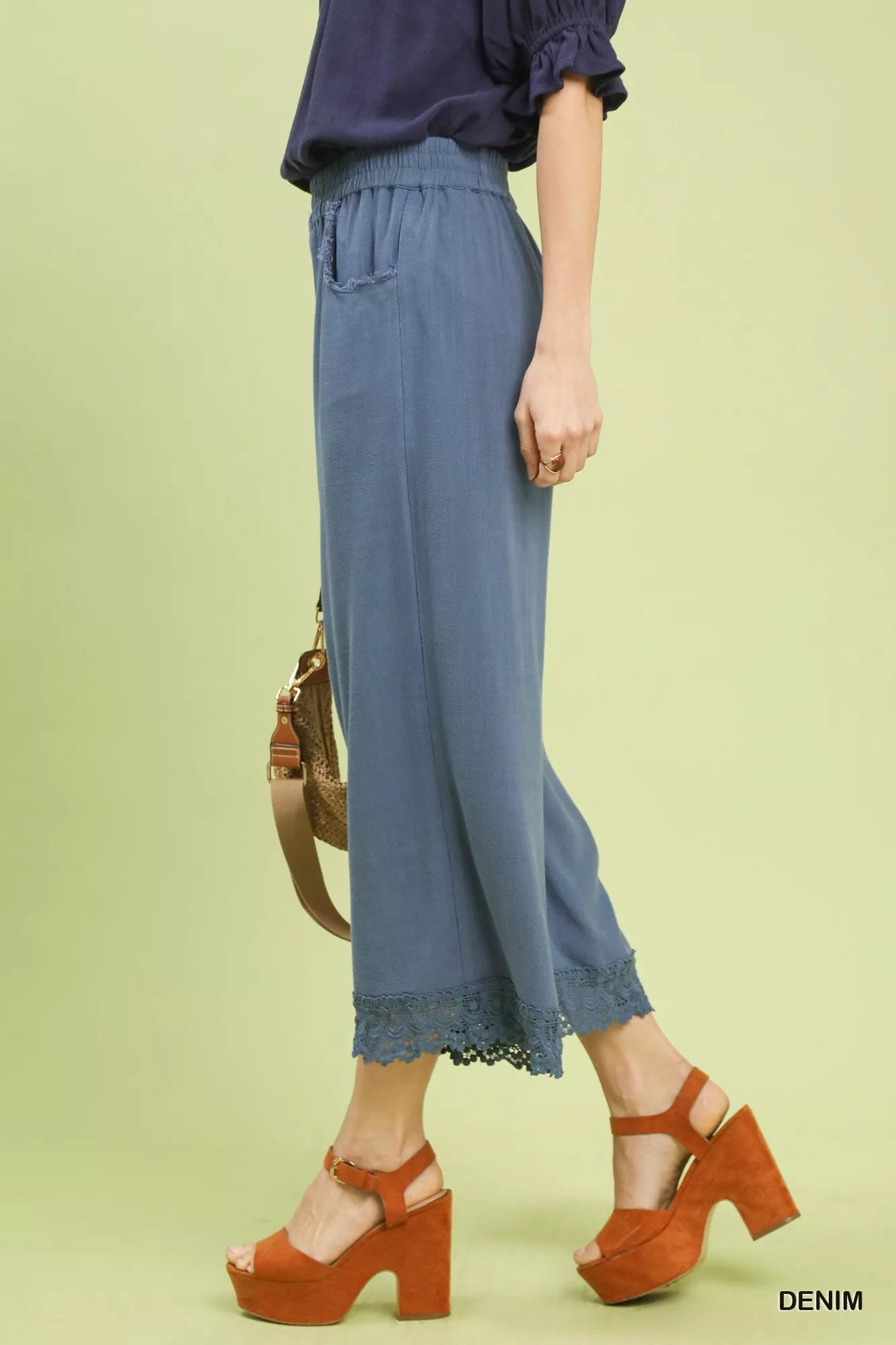 Umgee linen wide leg cropped pants with lace trim, side view showing elastic waist and pocket