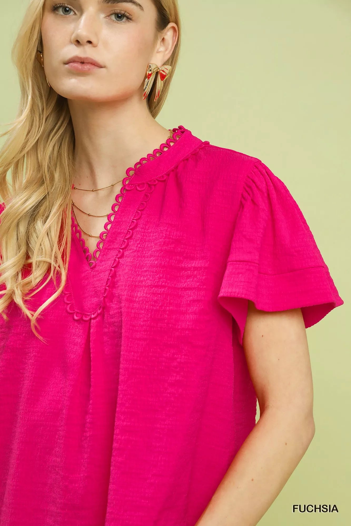 Fuchsia seersucker short sleeve top with lace trim detail, rayon/polyester blend