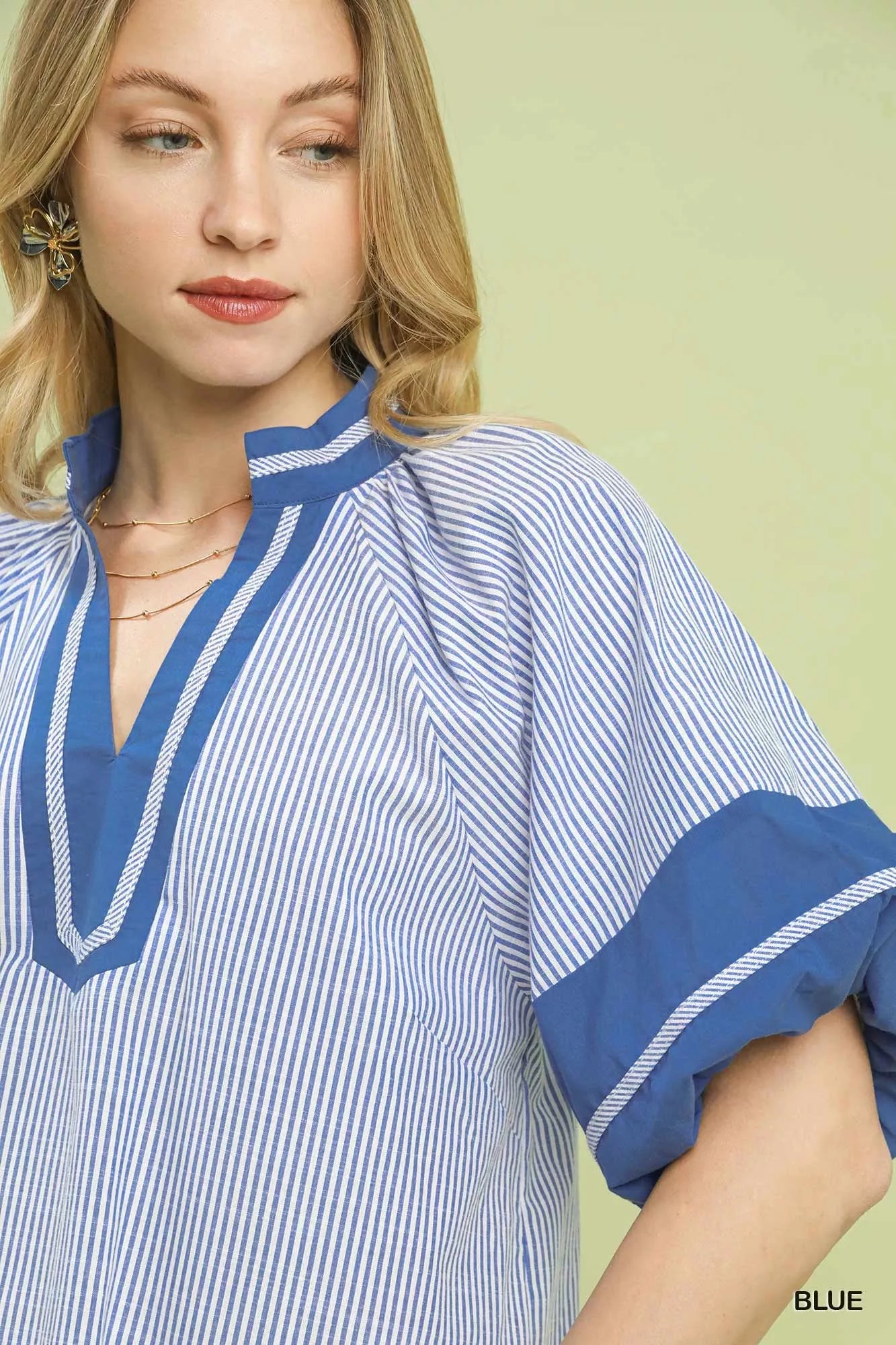 Blueberi Boutique Umgee blue striped mixed puff sleeve blouse close-up with V-neck