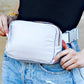 Roam Easy Wipe Nylon Padded 2L Sling Crossbody Belt Bag with Gold Hardware