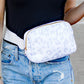Roam Easy Wipe Nylon Padded 2L Sling Crossbody Belt Bag with Gold Hardware