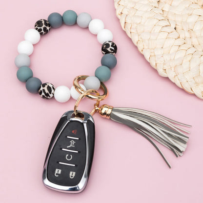 Luxe Silicone Bead Leopard Accent Monochromatic Stretchy Key Ring Bracelet with Suede Tassel | 4"