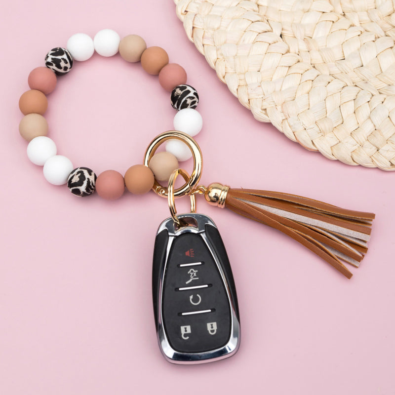 Luxe Silicone Bead Leopard Accent Monochromatic Stretchy Key Ring Bracelet with Suede Tassel | 4"