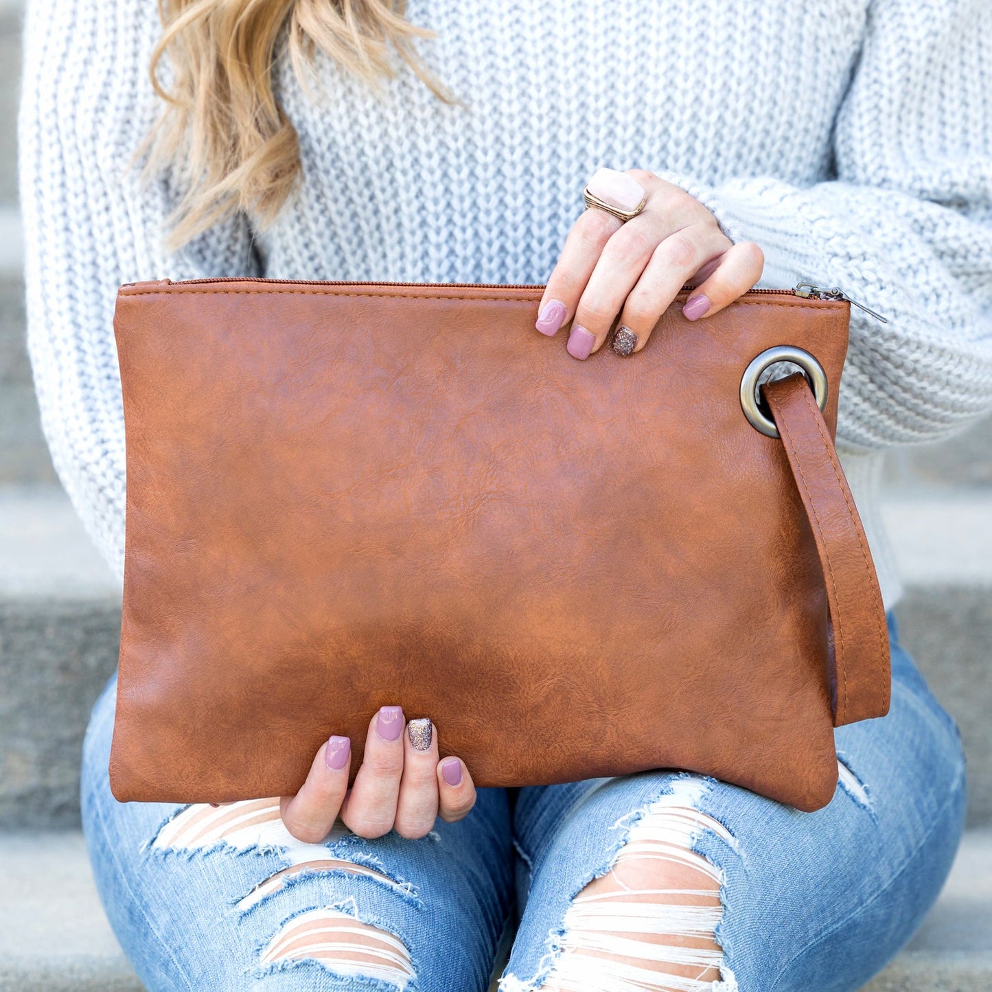 Soft Vegan PU Leather 100% Polyester Lined Grommet Detail Oversized Wristlet Clutch | 12" x 8"
