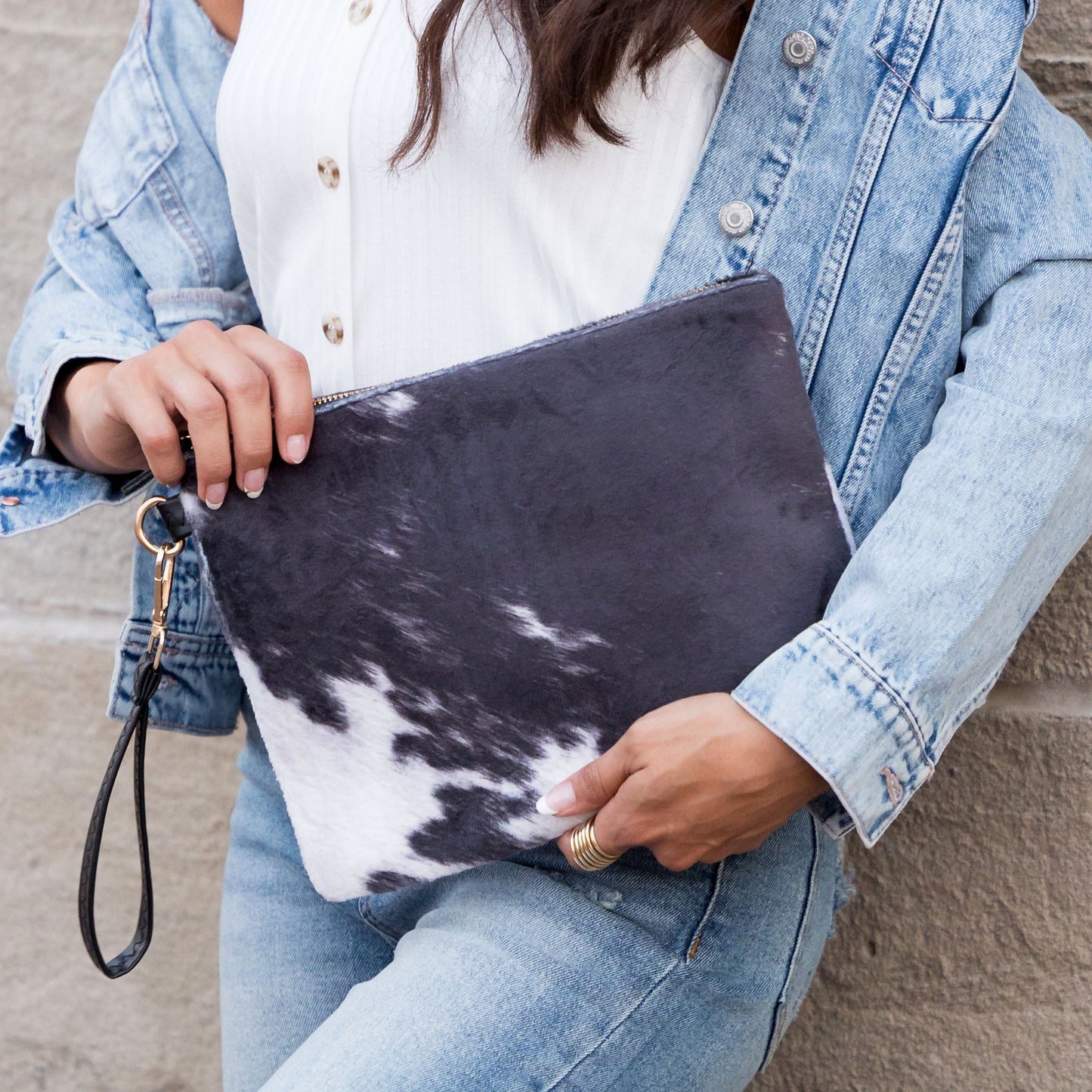 100% Polyester Faux Fur Cotton Lined Cow Print Removable Vegan Leather Wristlet Clutch