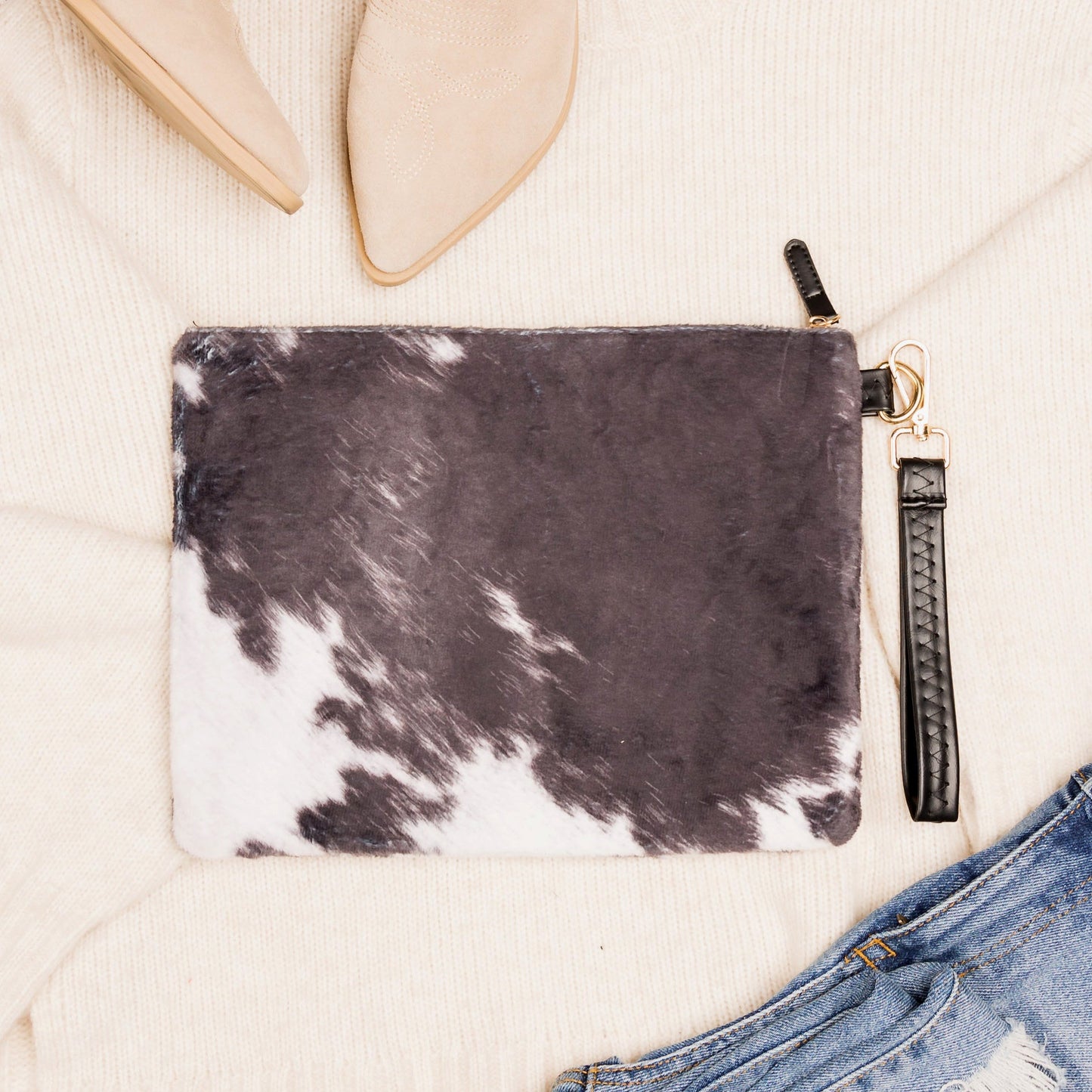 100% Polyester Faux Fur Cotton Lined Cow Print Removable Vegan Leather Wristlet Clutch