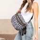 Dylan Oversized Leopard Print Double Zip Crescent Sling Bag with Vegan Leather Accents & Adjustable Strap