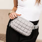 Evyn Quilted Puffer Nylon Sling Crossbody Belt Bag with Mesh Pockets & Adjustable Strap