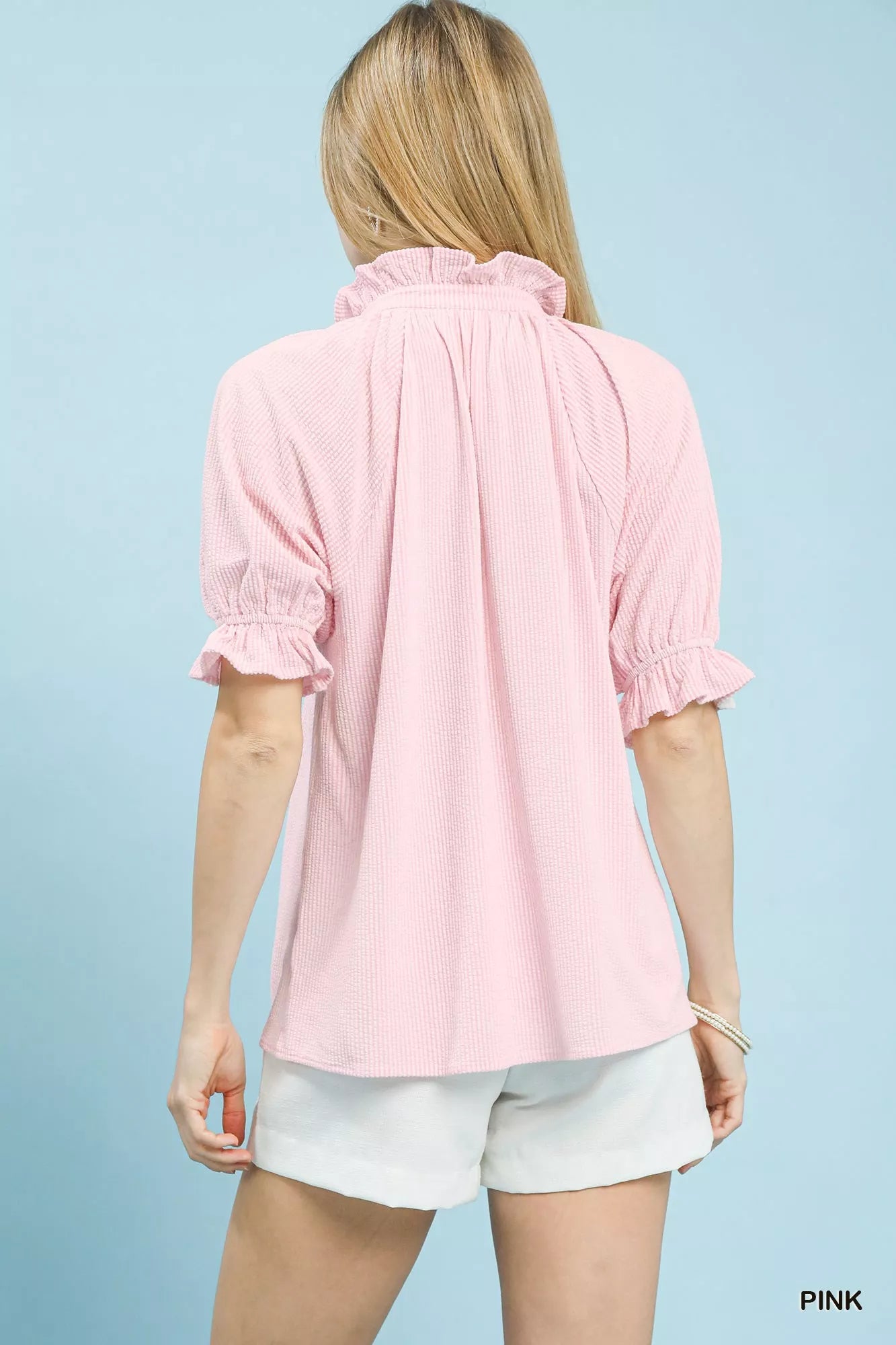 Pink textured ruffle sleeve v-neck top with ruffled collar
