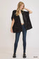Model wearing black open front knit cardigan with front pockets and jeans at Blueberi Boutique