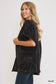 Side view of black open front knit cardigan with front pockets at Blueberi Boutique