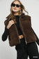 Brown sherpa-lined zip vest on model with black crop top at Blueberi Boutique