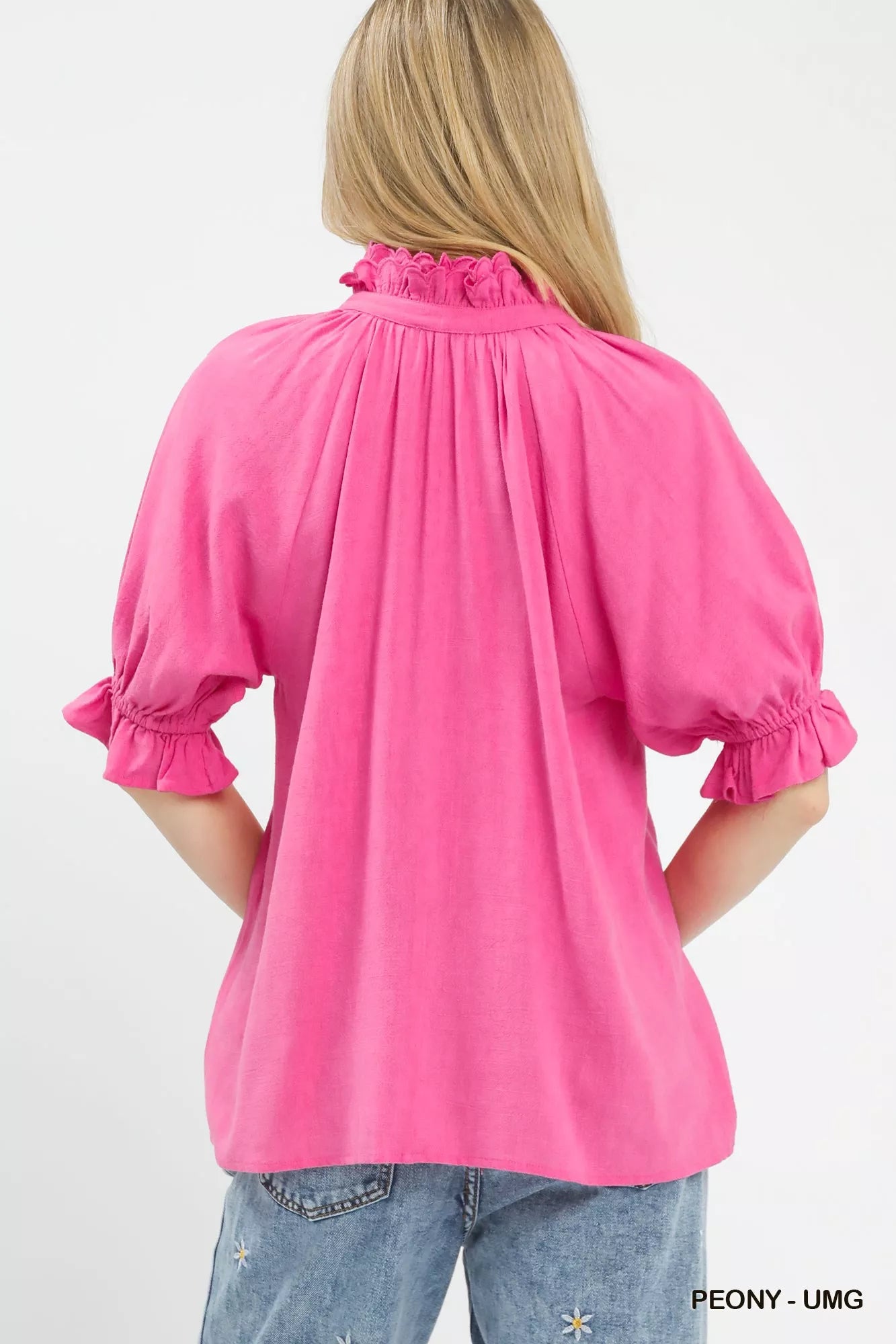 Back view of bright peony linen scalloped ruffle neck top at Blueberi Boutique