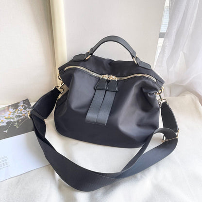 Demi 100% Nylon Hobo Crossbody Bag with Vegan Leather Accents