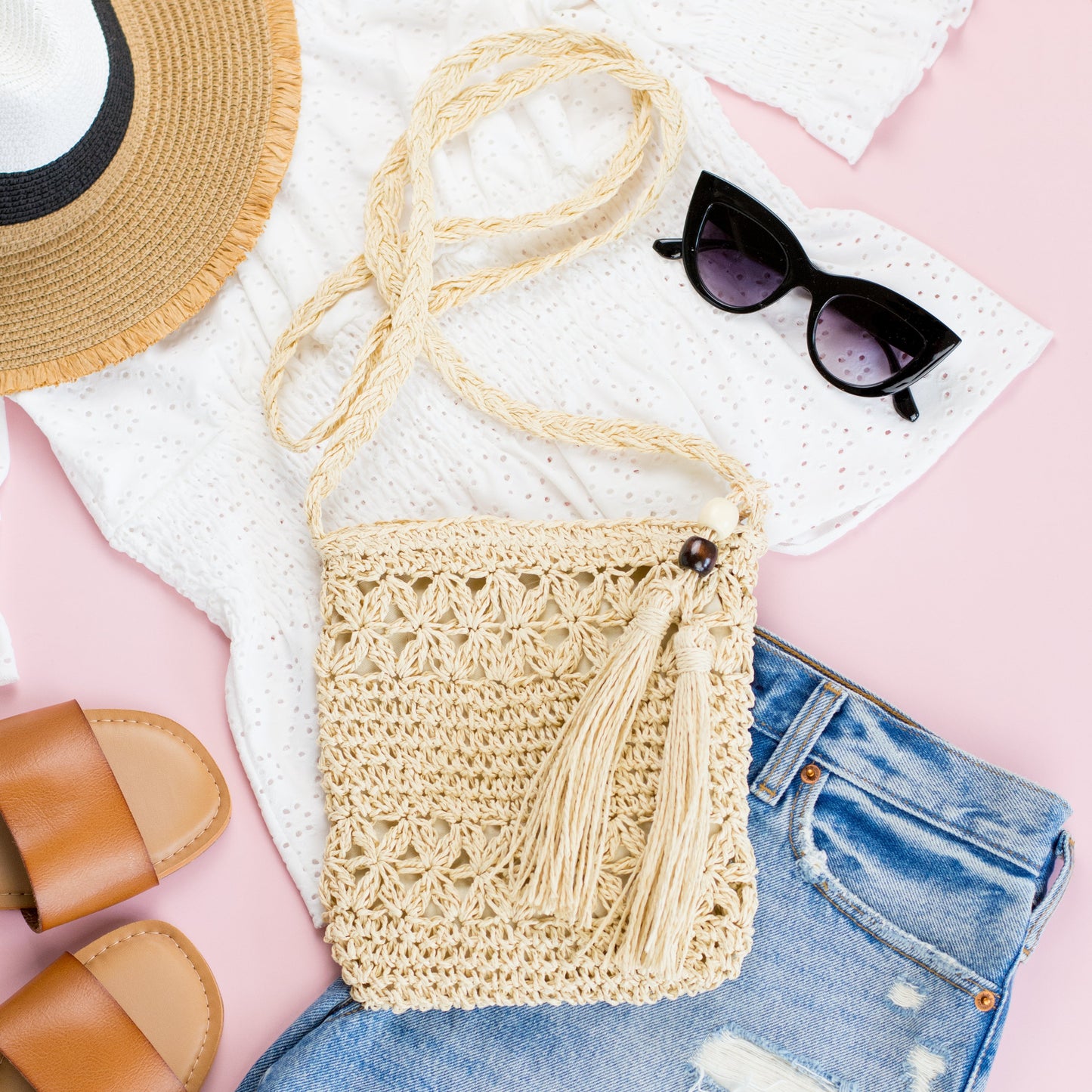 100% Straw Exterior Cotton Poly Lined Wood Bead Tassel Accent Fixed Woven Strap Crossbody Bag | 8" x 9"