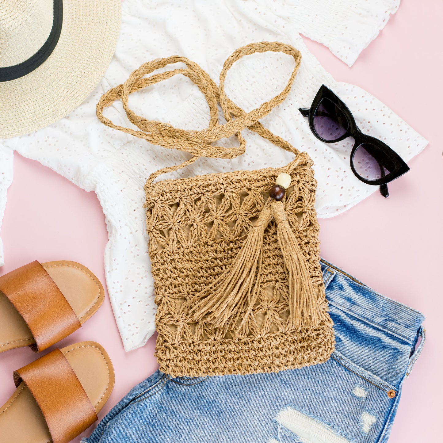 100% Straw Exterior Cotton Poly Lined Wood Bead Tassel Accent Fixed Woven Strap Crossbody Bag | 8" x 9"