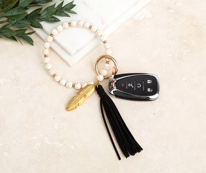 Genuine Stone Bead Suede Tassel Antique Gold Feather Charm Boho Key Ring Bracelet | 4"