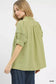 Blueberi Boutique sage puff sleeve top back view with decorative trim