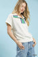 Blueberi Boutique cream Umgee striped collared top close-up with green zipper