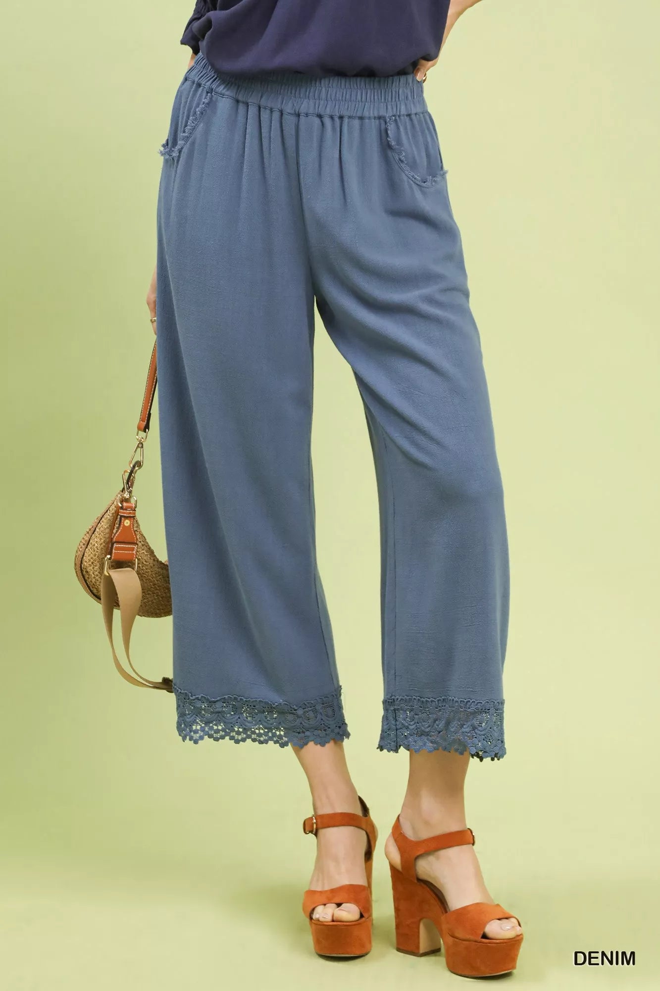 Umgee linen wide leg cropped denim pants with lace trim, elastic waist, paired with orange platform sandals