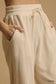 Umgee cream drawstring wide leg pants polyester close-up