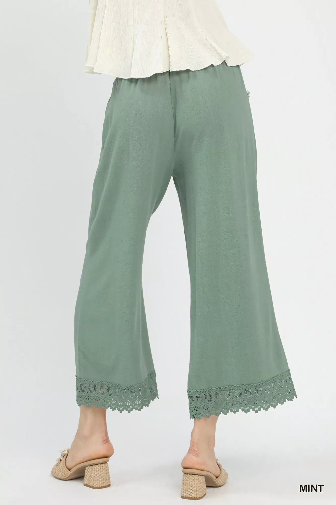 Blueberi Boutique: Mint linen wide-leg cropped pants with lace trim, back view