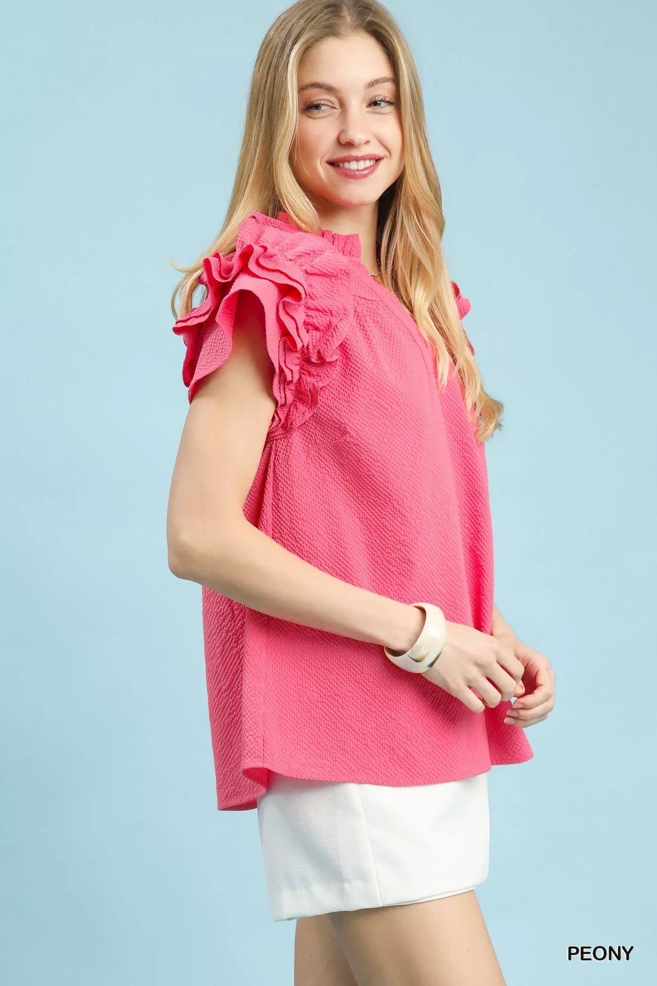 Umgee pink textured ruffle sleeve notched top close-up