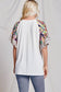 Women's Ruffle Trimmed Short Sleeved Floral Raglan Top